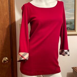 Burberry 3/4 sleeve knit top. Size M. Plaid cuffs.